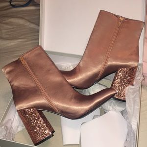 Pink high heel booties